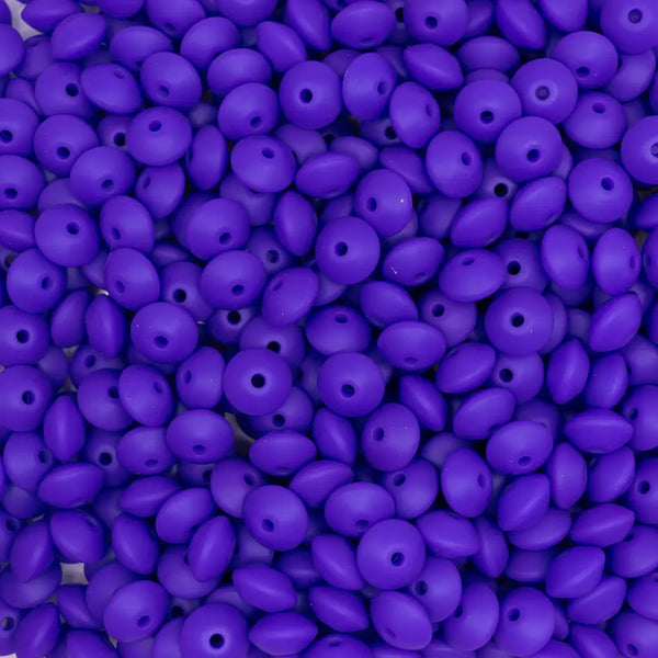 top view of a pile of 12mm Purple Lentil Silicone Bead