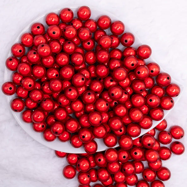 top  view of a pile of front view of a pile of 12mm Red Miracle Bubblegum Bead
