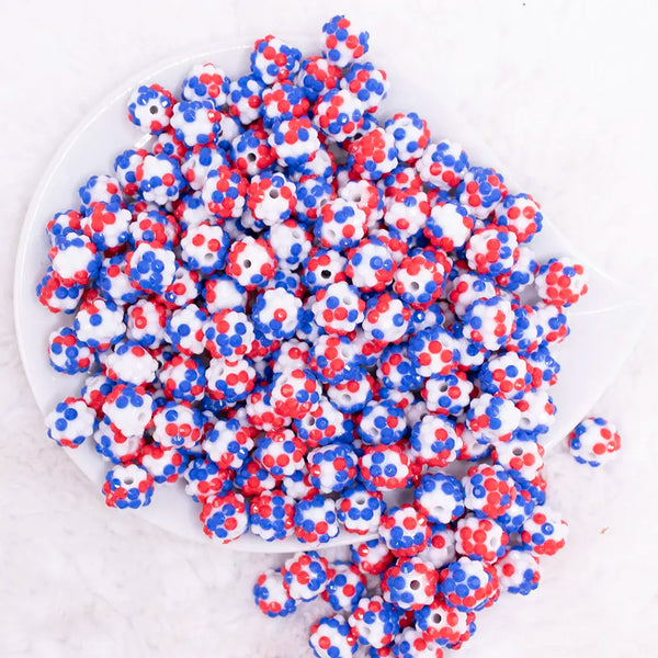 top view of a pile of 12mm Red, White and Blue Confetti Rhinestone Bubblegum Beads