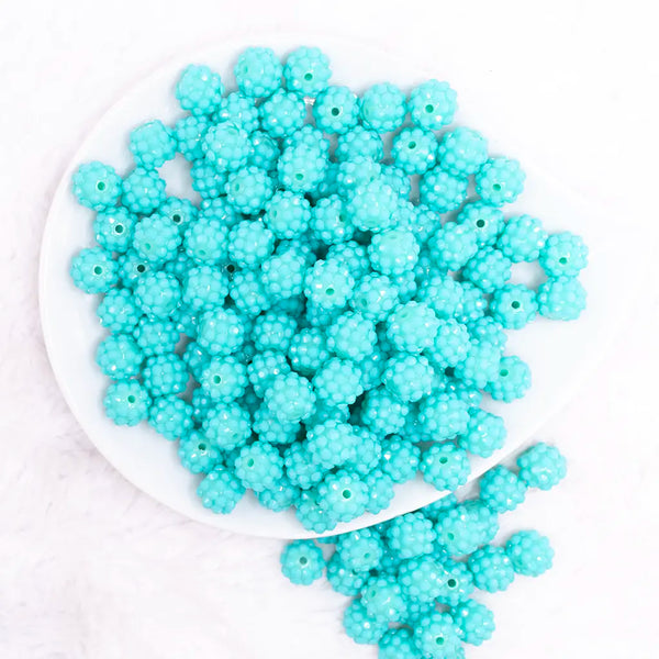 top view of a pile of 12mm Teal on Teal Rhinestone Bubblegum Beads