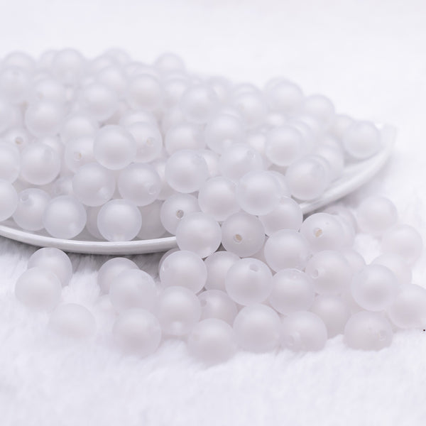 front view of a pile of 12mm White Frosted Shaped Bubblegum Beads