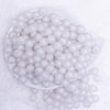 top view of a pile of 12mm White Frosted Shaped Bubblegum Beads