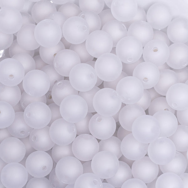 close up view of a pile of 12mm White Frosted Shaped Bubblegum Beads