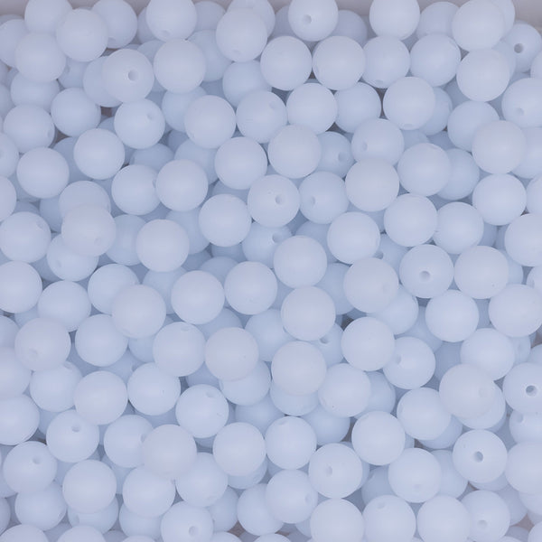 top view of a pile of 12mm White Glow In The Dark Silicone Bead