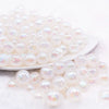 front view of a pile of 12mm White Opal Bubblegum Beads - 20 Count