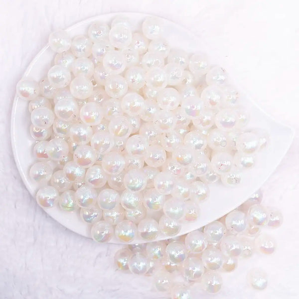 top view of a pile of 12mm White Opal Bubblegum Beads - 20 Count