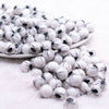 front of a pile of 12mm White with Black Spider Print Bubblegum Beads