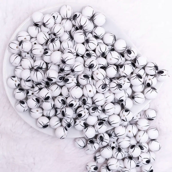 top of a pile of 12mm White with Black Spider Print Bubblegum Beads