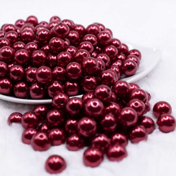 front view of a pile of 12mm Wine Red Pearl Acrylic Bubblegum Beads