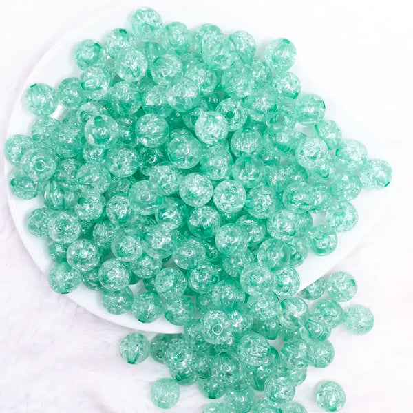 top view of a pile of 12mm Wintergreen Crackle Bubblegum Beads