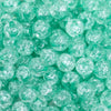 close up view of a pile of 12mm Wintergreen Crackle Bubblegum Beads