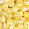 close up view of a pile of 12mm Yellow Acrylic Bubblegum Bead Mix
