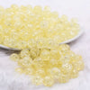 front view of a pile of 12mm Yellow Crackle Bubblegum Beads