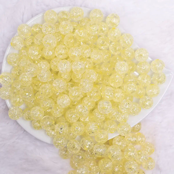 top view of a pile of 12mm Yellow Crackle Bubblegum Beads