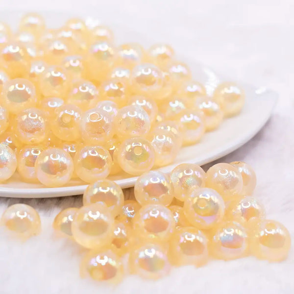 front view of a pile of 12mm Yellow Opal Bubblegum Beads - 20 Count