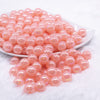 front view of a pile of 12mm Cotton Candy Pink Jelly AB Acrylic Bubblegum Beads - 20 Count