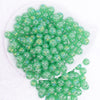 top view of a pile of 12mm Green Jelly AB Acrylic Bubblegum Beads - 20 Count