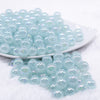 front view of a pile of 12mm Ice Blue Jelly AB Acrylic Bubblegum Beads - 20 Count