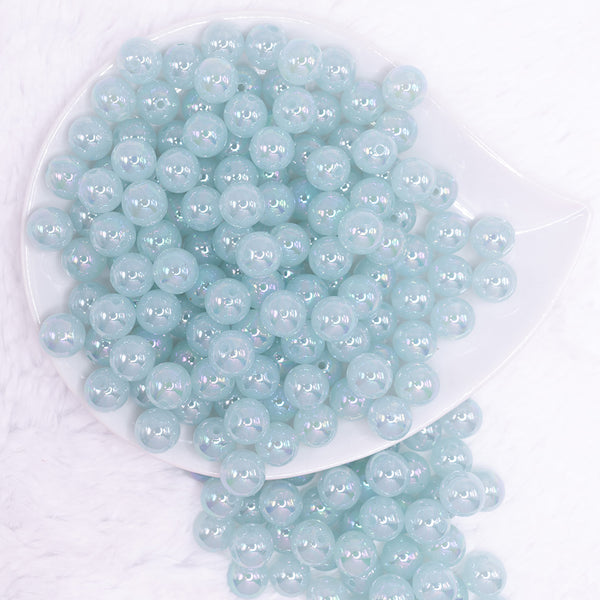 top view of a pile of 12mm Ice Blue Jelly AB Acrylic Bubblegum Beads - 20 Count