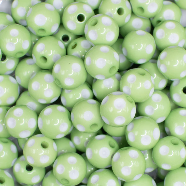 close up view of a pile of 12mm Light Green with White Polka Dot Acrylic Bubblegum Beads