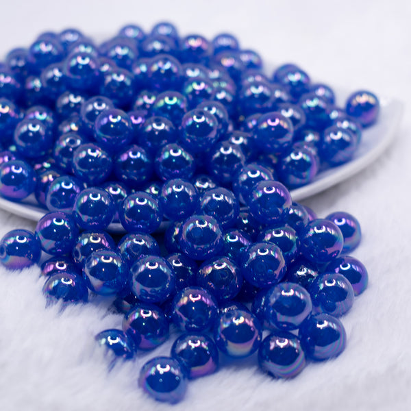 front view of a pile of 12mm Royal Blue Jelly AB Acrylic Bubblegum Beads - 20 Count