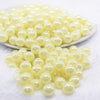 front view of a pile of 12mm Yellow Jelly AB Acrylic Bubblegum Beads - 20 Count