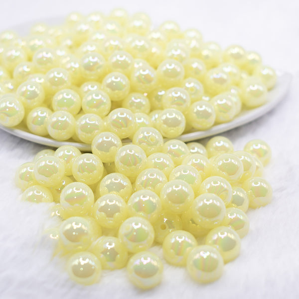 front view of a pile of 12mm Yellow Jelly AB Acrylic Bubblegum Beads - 20 Count