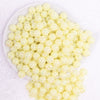 top view of a pile of 12mm Yellow Jelly AB Acrylic Bubblegum Beads - 20 Count