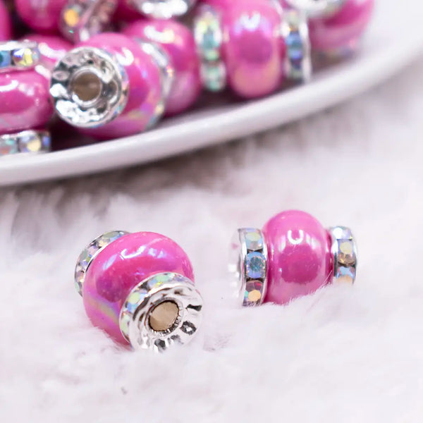 macro view of a pile of 15mm Hot Pink Spacer Bead with Rhinestone Rondelle - 5 Count per order