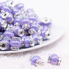 front view of a pile of 15mm Light Purple Spacer Bead with Rhinestone Rondelle - 5 Count per order