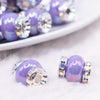macro view of a pile of 15mm Light Purple Spacer Bead with Rhinestone Rondelle - 5 Count per order