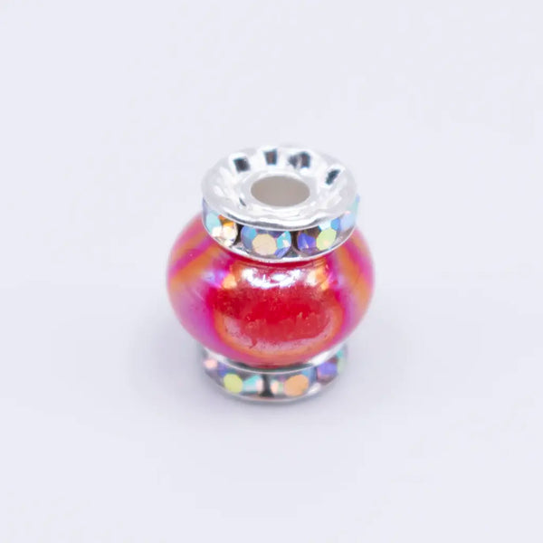 top view of a a pile of 15mm Red Spacer Bead with Rhinestone Rondelle - 5 Count per order