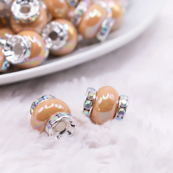 macro view of a pile of 15mm Sand Spacer Bead with Rhinestone Rondelle - 5 Count per order