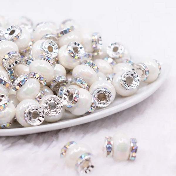 front view of a pile of 15mm White Spacer Bead with Rhinestone Rhondelle