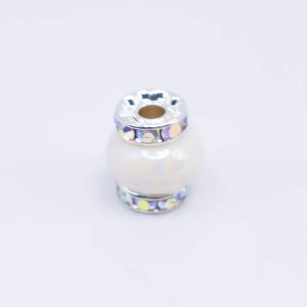 macro view of a pile of 15mm White Spacer Bead with Rhinestone Rhondelle