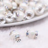 top view of a pile of 15mm White Spacer Bead with Rhinestone Rhondelle