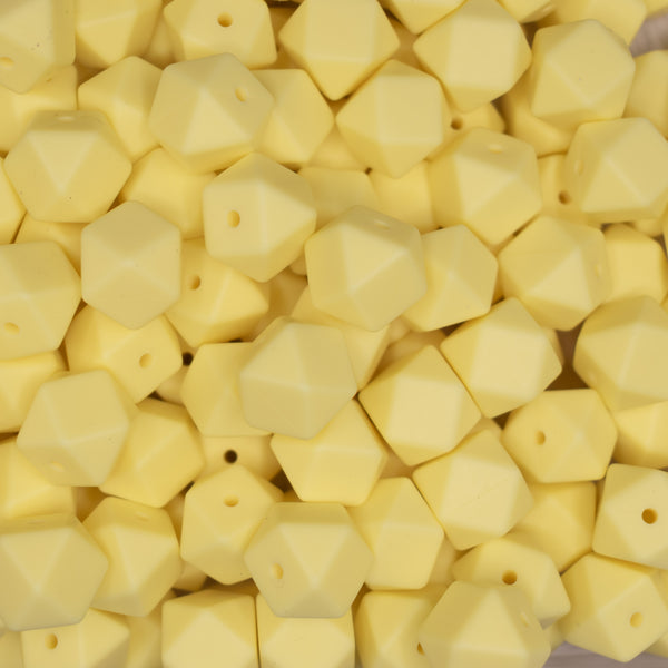 top view of a pile of 14mm Cream Yellow Hexagon Silicone Bead