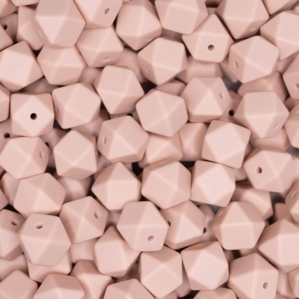 top view of a pile of 14mm Peach Hexagon Silicone Bead
