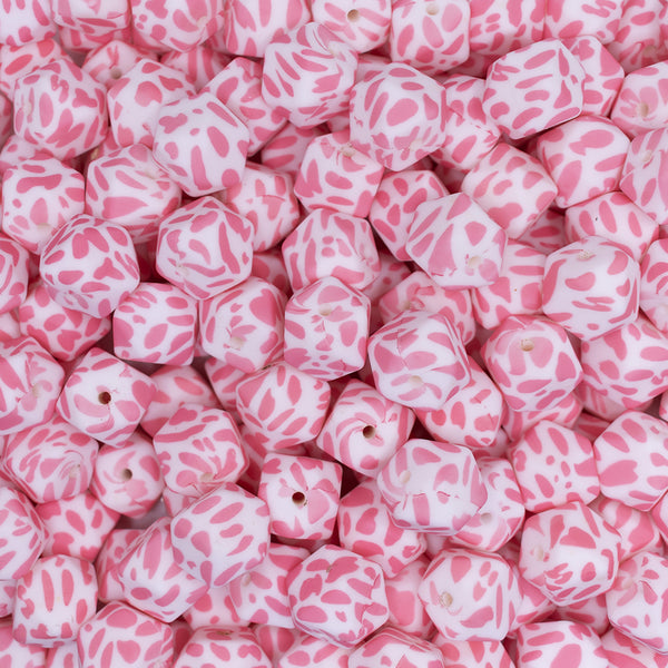 close up view of a pile of 14mm Pink Cow Print Hexagon Silicone Bead