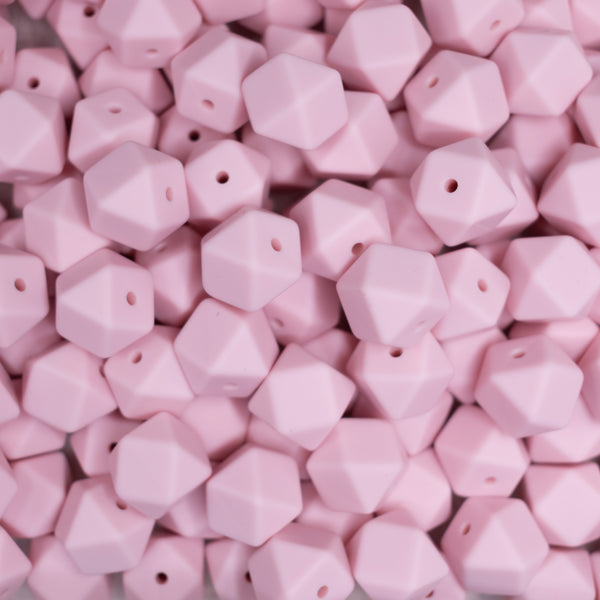 top view of a pile of 14mm Quartz Pink Hexagon Silicone Bead