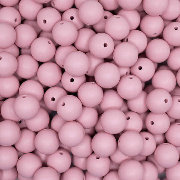 top view of a pile of 15mm Blush Pink Round Silicone Bead