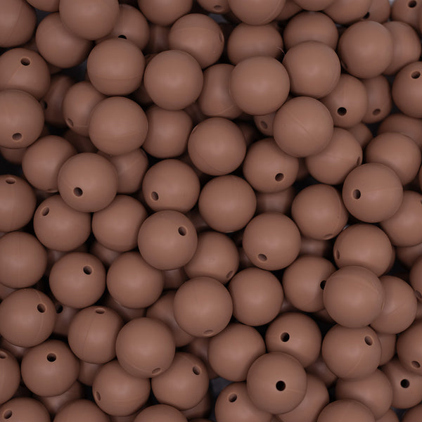 top view of a pile of 15mm Camel Brown Round Silicone Bead