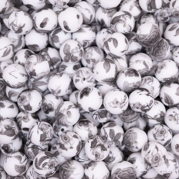 top view of a pile of 15mm Gray Floral Print Silicone Bead