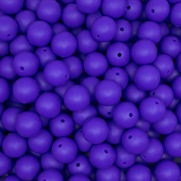 top view of a pile of 15mm Deep Purple Round Silicone Bead
