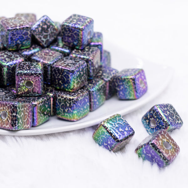front view of a pile of 15mm Black Leopard luxury square acrylic beads