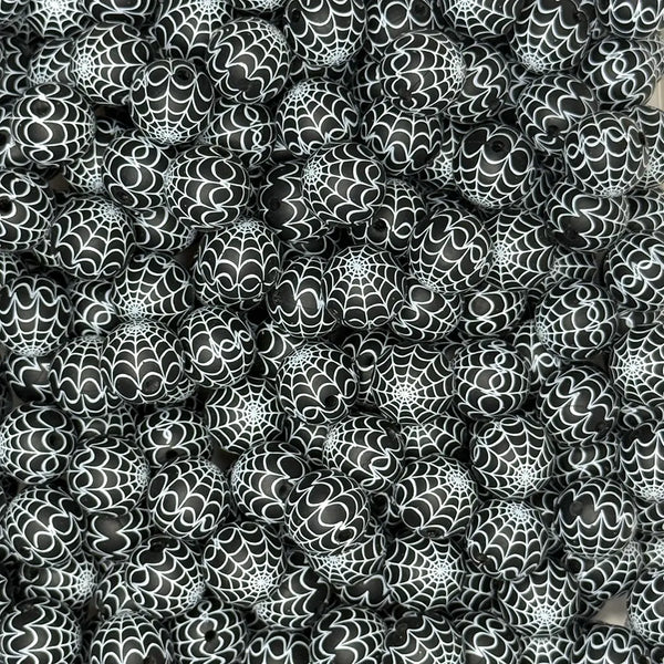 close up view of 15mm Black Spider Web Print Silicone Bead
