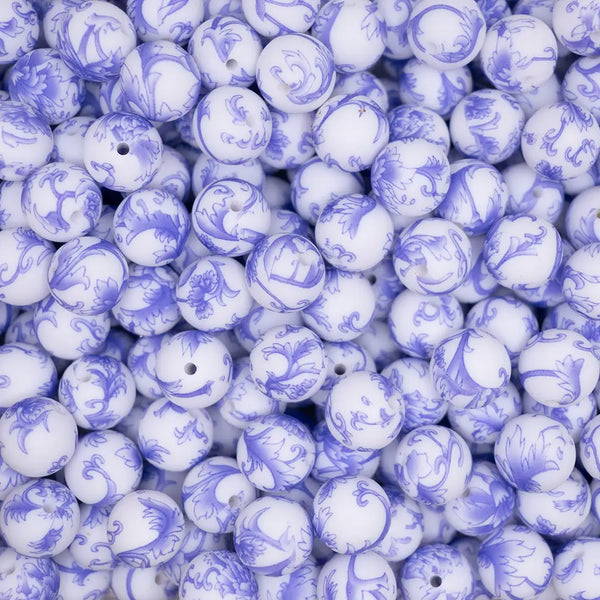 top view of a pile of 15mm Blue Filagree Print Silicone Bead