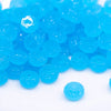 front view of a pile of 12mm Blue Glow In the Dark Resin Rondelle Spacer Beads - Set of 20