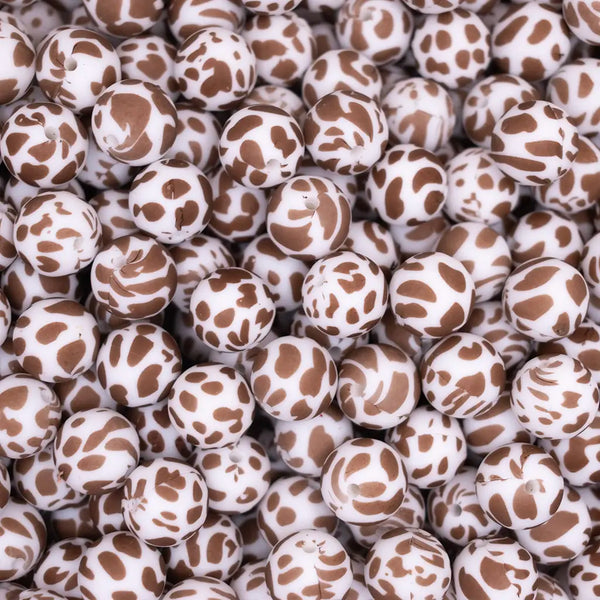 top view of a pile of 15mm Brown Cow Print Silicone Bead