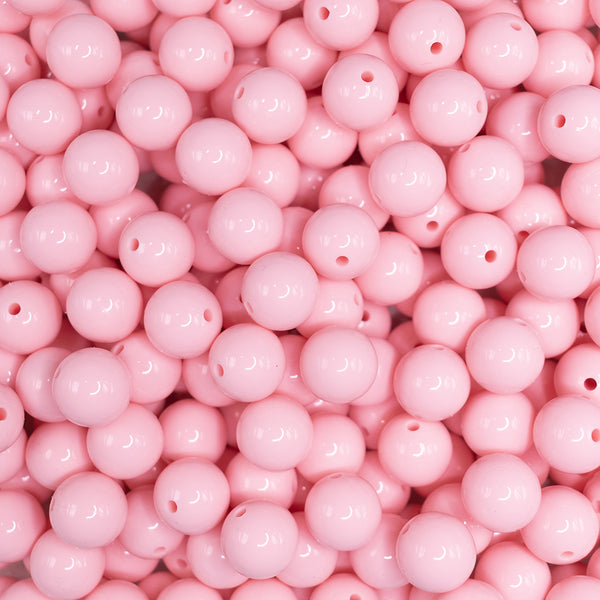 front view of a pile of15mm Candy Pink Liquid Style Silicone Bead